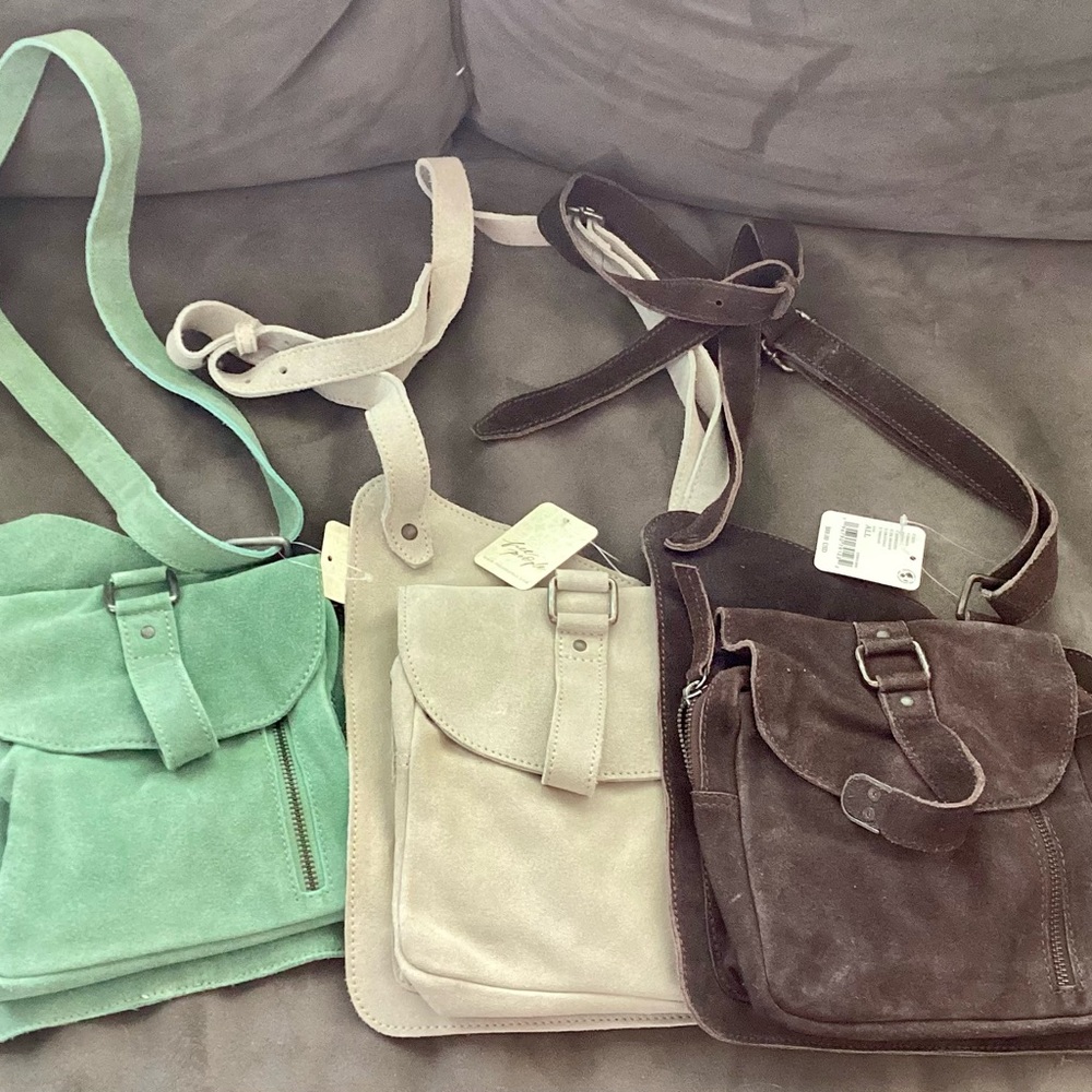 Cornell suede crossbody bag ( orig$88)new
mint green color. See small blemishes